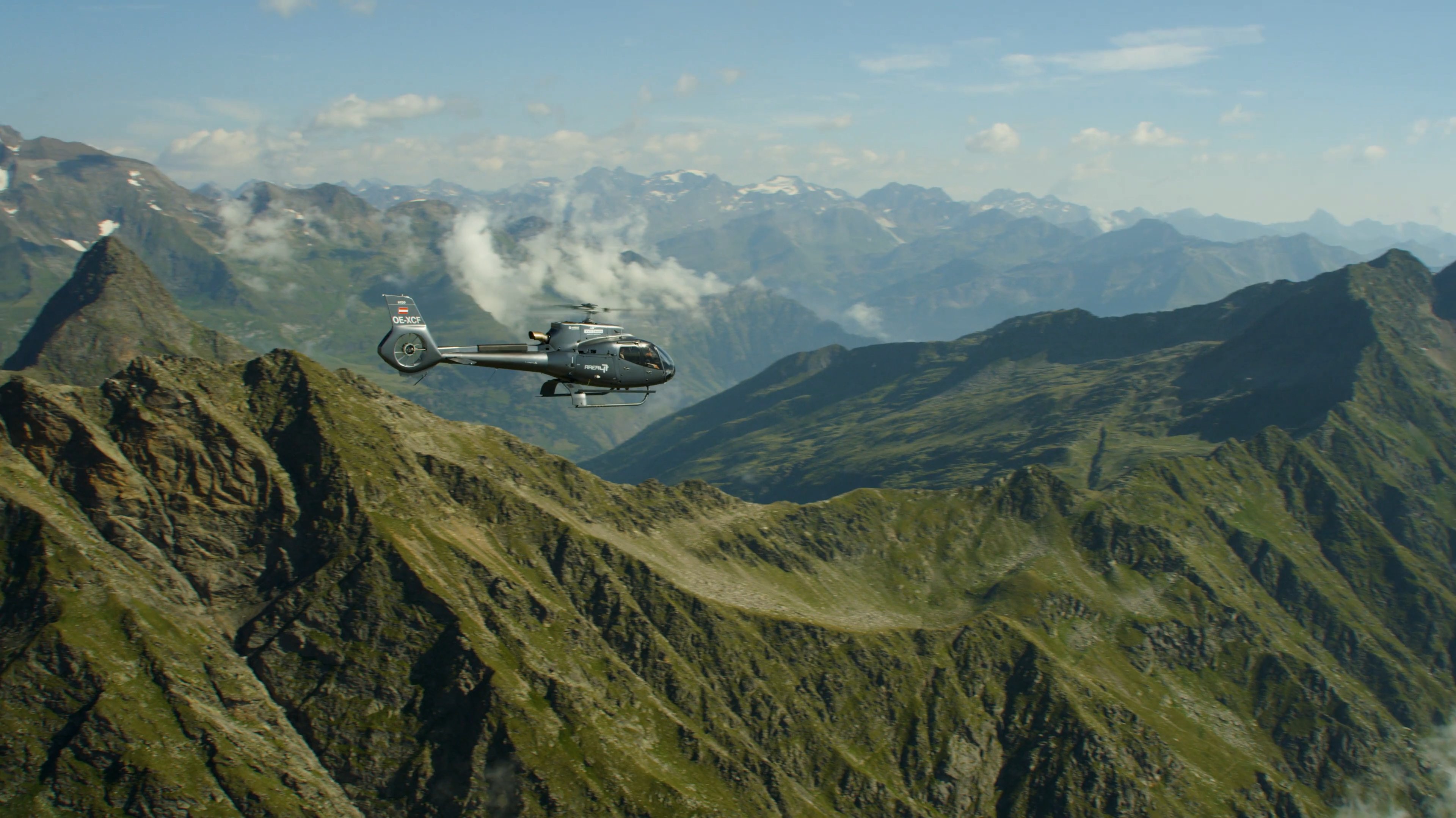 helicopter above mountains